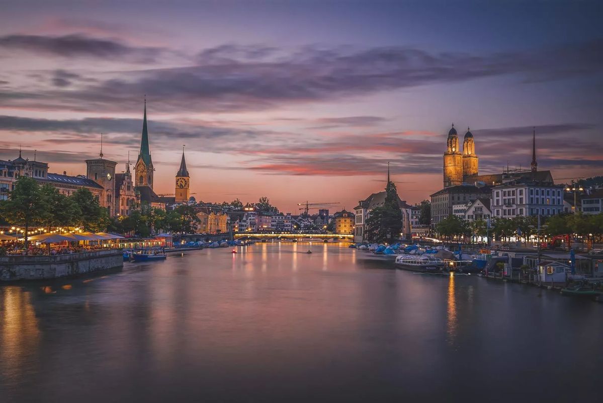 Zurich waterfront at sunset representing world-class education in Switzerland